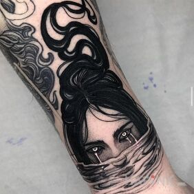 Tattoo Girl diving On the arm motif: black and gray style: graphic / illustrative