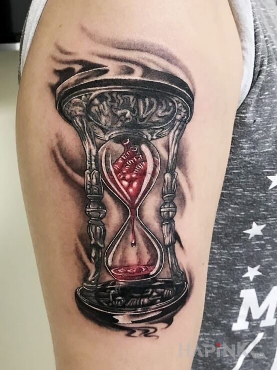 Tattoo Zegar in objects motif on the forearm