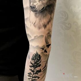 Tattoo Wolf, forest on the forearm motif: sleeves