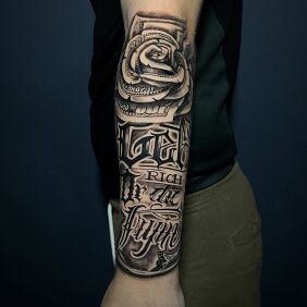 Tattoo Dollar rose forearm tattoo on the forearm motif: criminal lettering style: graphic / illustrative