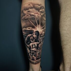 Tattoo Father and Son at the Stadium on the leg motif: Love style: realistic