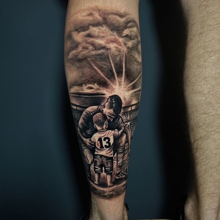 Tattoo Father and Son at the Stadium in characters motif and realistic style on the leg