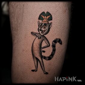 Tattoo King Julian on the thigh motif: funny style: cartoon / comic book