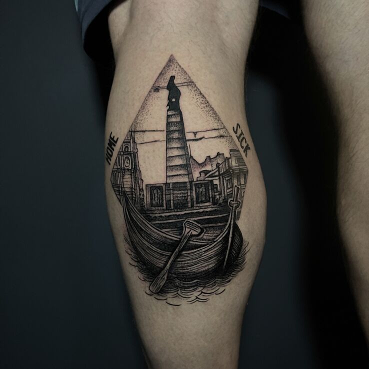Tattoo Symbols of the city of Łódź in black and gray motif and graphic / illustrative style on the leg