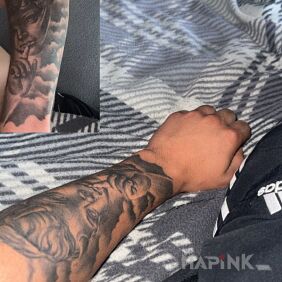 Tattoo Angel on the forearm motif: religious style: realistic