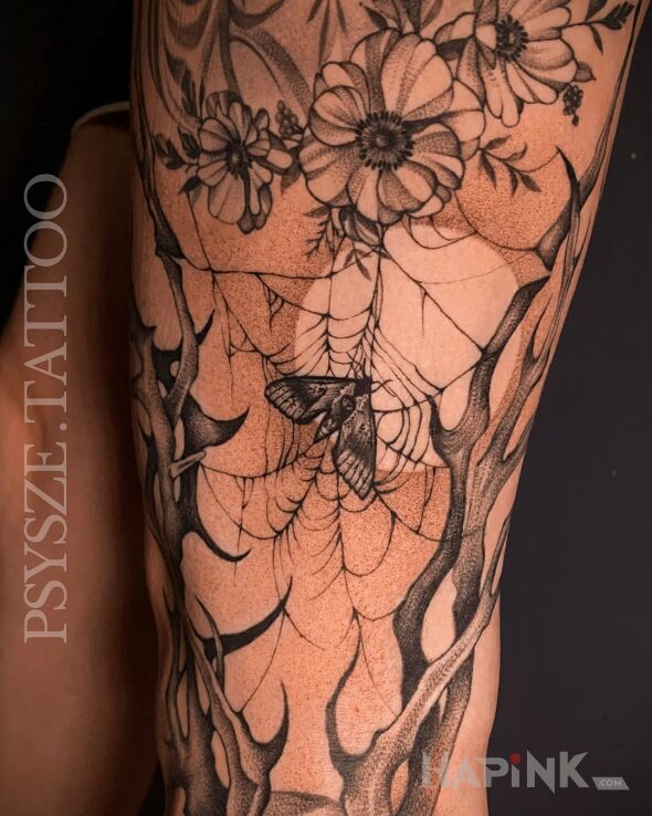 Tattoo Moth in dotwork in flowers motif and graphic / illustrative style on the leg