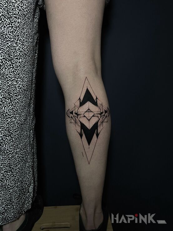 Tattoo Calf Geometry in black and gray motif and geometric style on the calf