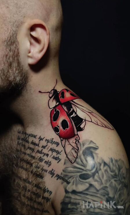 Tattoo Ladybug in color in insects motif and cartoon / comic book style on the shoulder