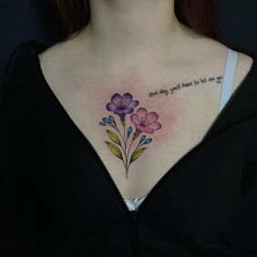 Tattoo Colorful flowers cleavage between breasts between the breasts motif: colorful style: graphic / illustrative