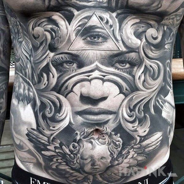 Tattoo Trzecie oko in faces motif and realistic style on the ribs