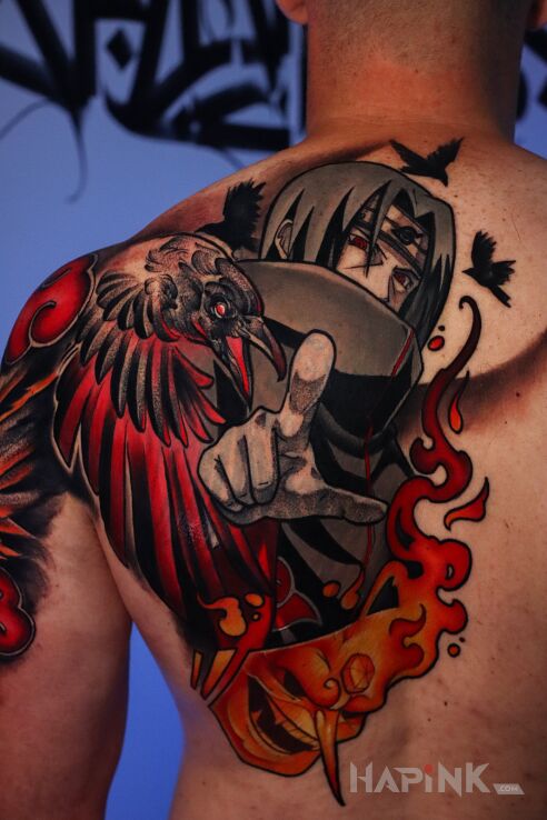 Tattoo Itachi cover-up tattoo in manga / anime motif and cartoon / comic book style on the shoulder blades