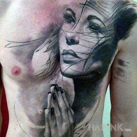 Tattoo Demonic girl on the chest motif: faces style: realistic