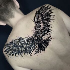 Tattoo Raven in a dark style on the upper back on the back motif: dark style: graphic / illustrative