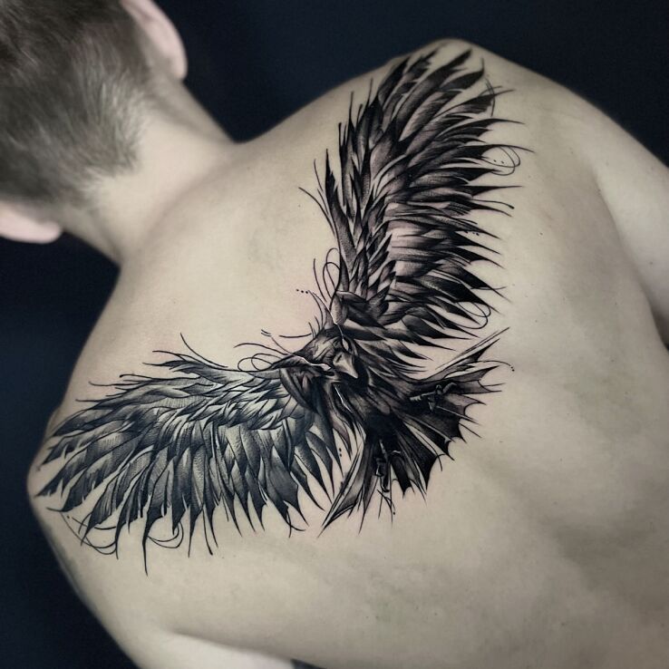 Tattoo Raven in a dark style on the upper back in animals motif and graphic / illustrative style on the back