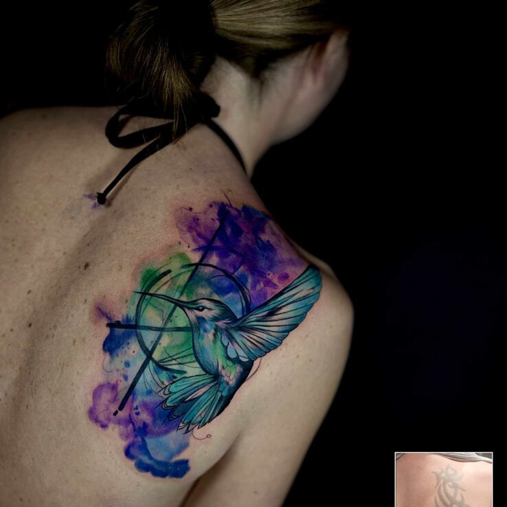 Tattoo Colorful hummingbird covering an old tattoo in cover-up motif and Watercolor style on the back