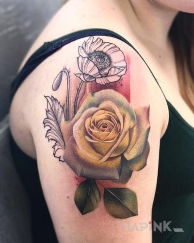 Tattoo Żółta róża in flowers motif and realistic style on the upper arm