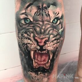 Tattoo White tiger on the leg motif: animals style: realistic