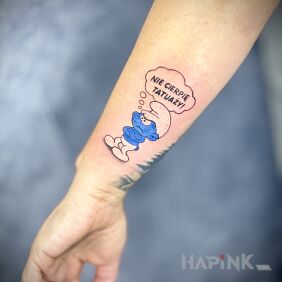 Tattoo Grumpy Smurf On the arm motif: funny style: cartoon / comic book