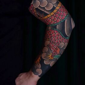 Tattoo Dragon in the Clouds on the elbow motif: dragons style: japanese / irezumi