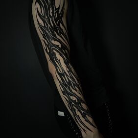 Tattoo Black neotribal full sleeve on the shoulder motif: dark style: abstract