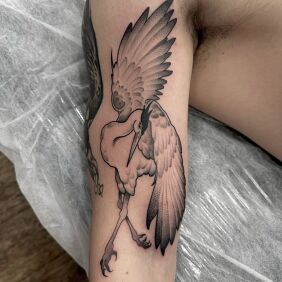 Tattoo Crane On the arm motif: animals style: graphic / illustrative
