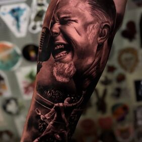 Tattoo Portrait of James Hetfield on the forearm motif: black and gray style: realistic