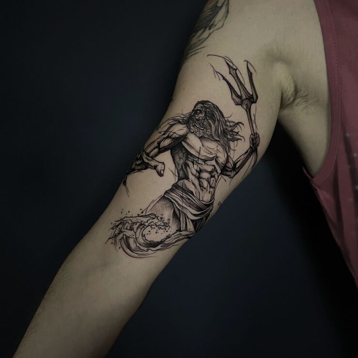 Tattoo Poseidon black and gray shaded in black and gray motif and sketch style on the bicep