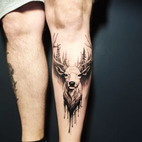 Tattoo Deer against a background of trees on the tibia motif: black and gray style: realistic