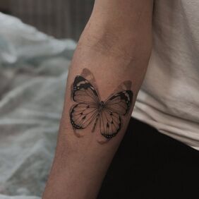 Tattoo Delicate Butterfly On the arm style: dotwork