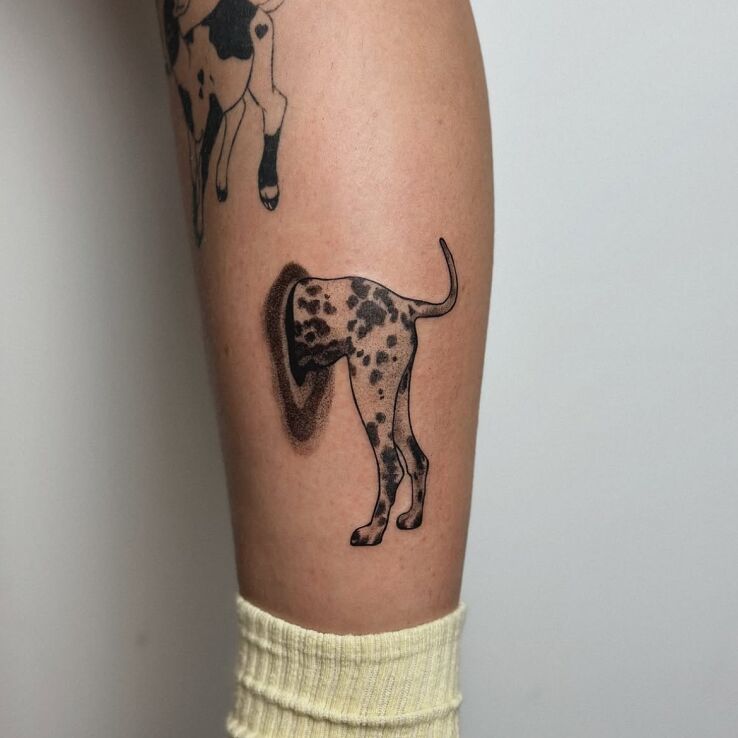 Tattoo The Vanishing Dalmatian in graphic / illustrative style on the calf