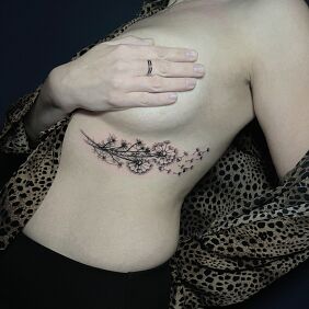 Tattoo Dandelions with skulls on the ribs motif: floral style: graphic / illustrative
