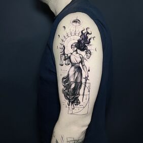 Tattoo Just Themis on the upper arm motif: fantasy style: graphic / illustrative