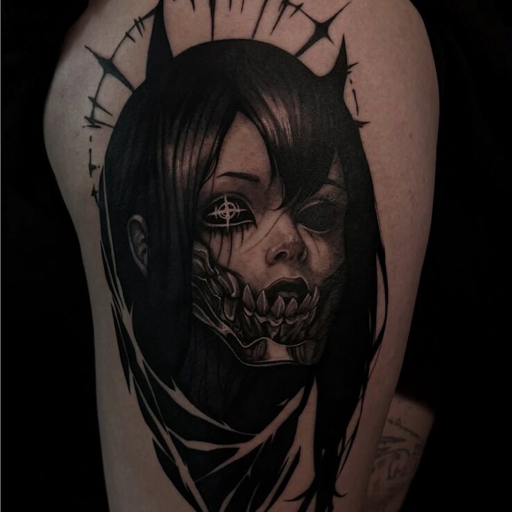 Tattoo Demonica with a Halo in dark motif and graphic / illustrative style on the thigh