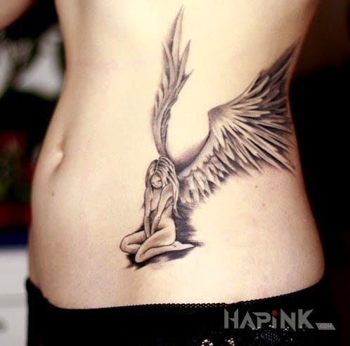 Tattoo Aniołek in sexy motif on the ribs