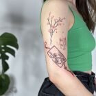 Delicate Japanese composition with sakura and Kitsune mask