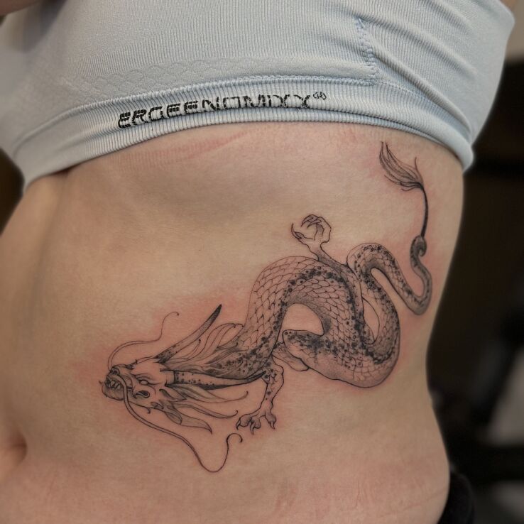 Tattoo Oriental Dragon on the Side in dragons motif and japanese / irezumi style on the ribs