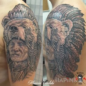Tattoo Indian on the upper arm motif: Indian style: realistic