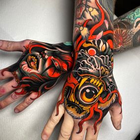 Tattoo Vampire Woman and Tiger with an Eye in its Mouth On the arm motif: faces style: neo-traditional