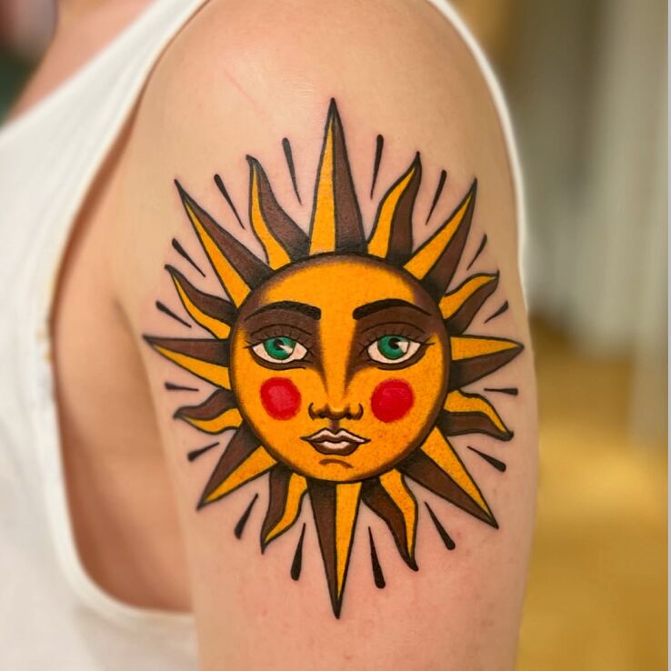 Tattoo Sun with a Face - Classic Oldschool in faces motif and neo-traditional style On the arm
