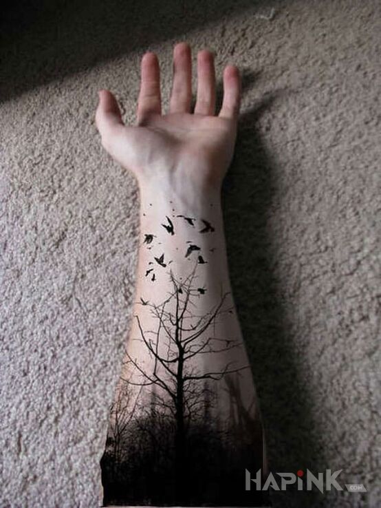 Tattoo Mroczny las in other motif on the forearm