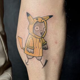 Tattoo Pijjin as Pikachu on the leg motif: characters style: graphic / illustrative