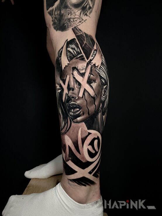 Tattoo Devil Woman in demons motif and realistic style on the leg