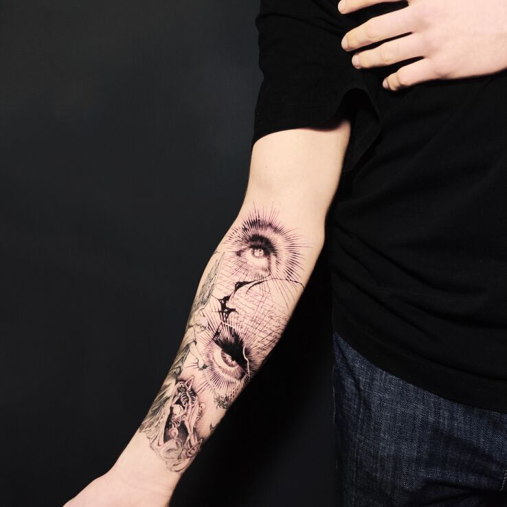 Tattoo Eyes Gazing in black and gray motif and graphic / illustrative style on the forearm