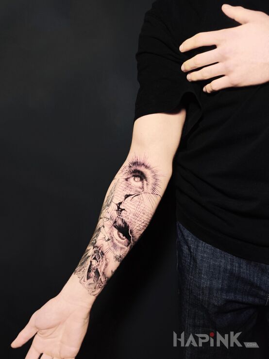 Tattoo Eyes Gazing in black and gray motif and graphic / illustrative style on the forearm