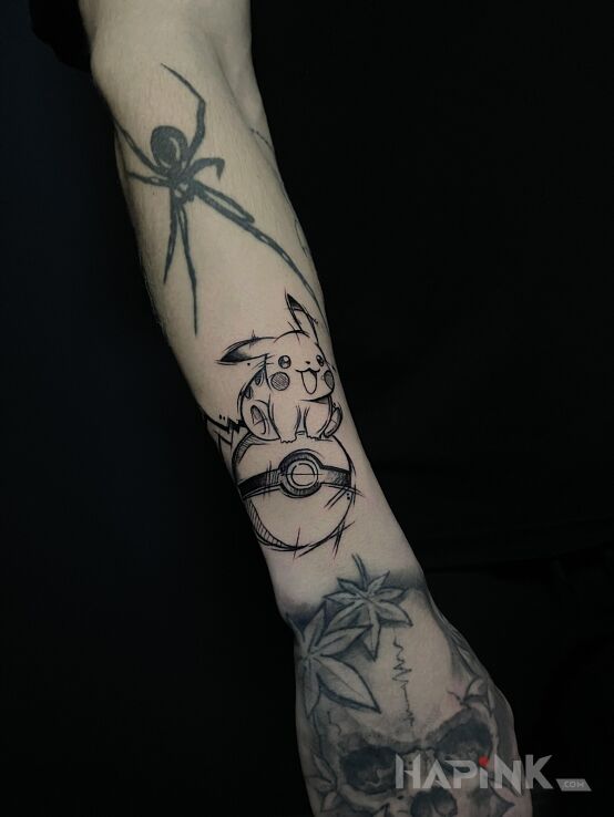 Tattoo Pikachu on a Pokeball in black and gray motif and graphic / illustrative style on the forearm