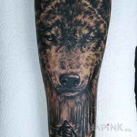Tattoo Wolf watching over the boy on the forearm motif: characters style: realistic