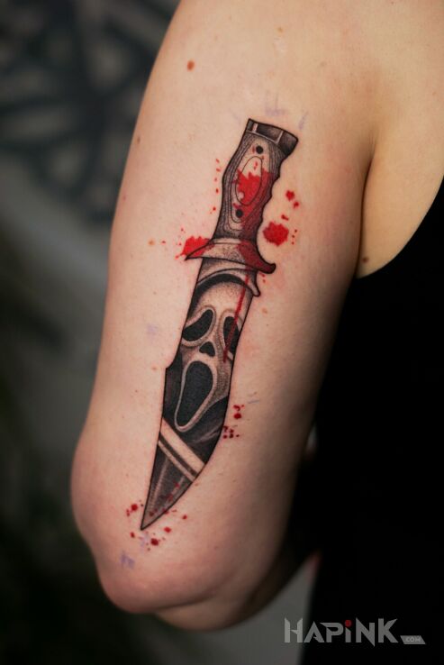 Tattoo Ghostface in a Knife I Horror in colorful motif and dotwork style On the arm
