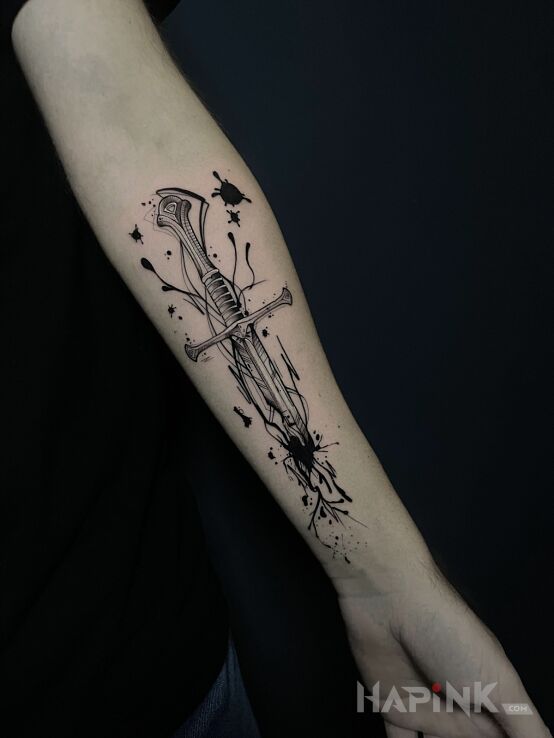 Tattoo Crumbling Dagger in fantasy motif and graphic / illustrative style on the forearm