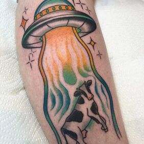 Tattoo Cosmic Abduction on the leg motif: funny style: oldschool