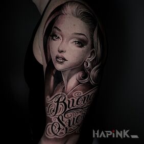 Tattoo Dark Beauty on the shoulder motif: black and gray style: calligraphy